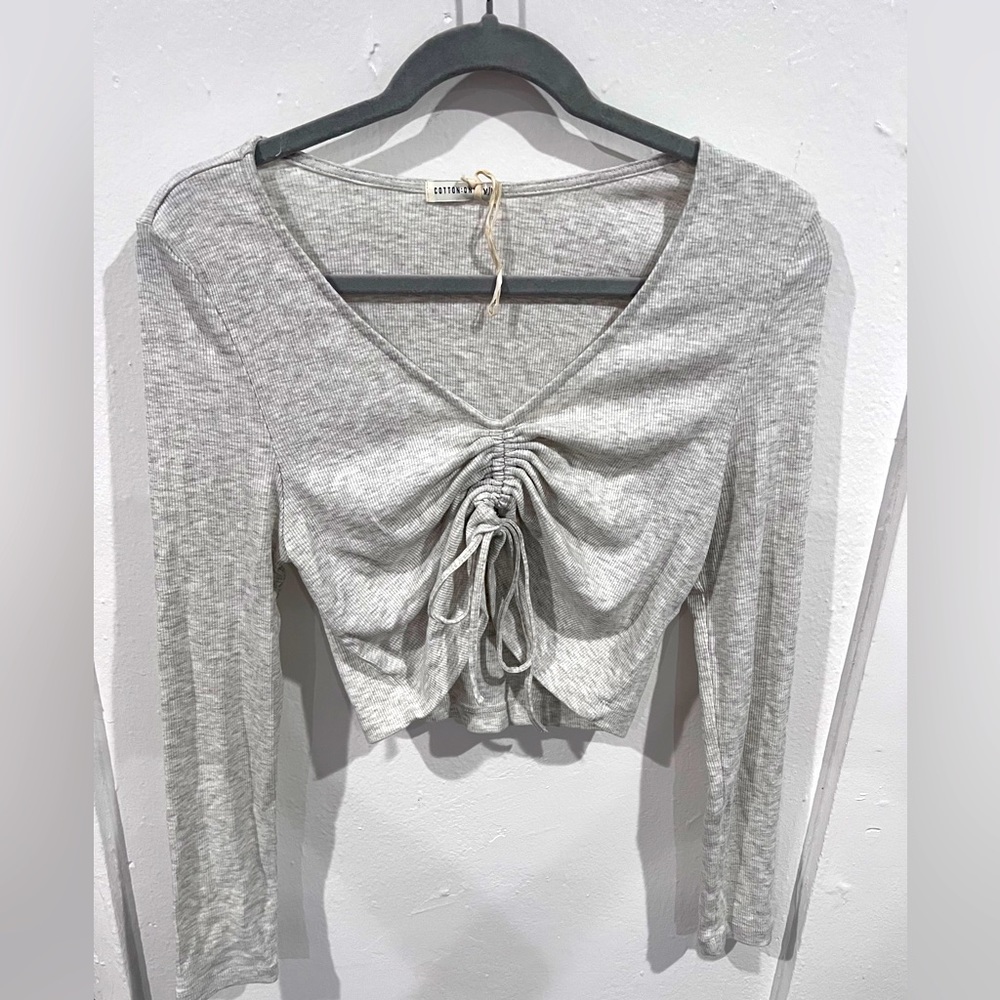 Grey cropped long sleeve shirt
